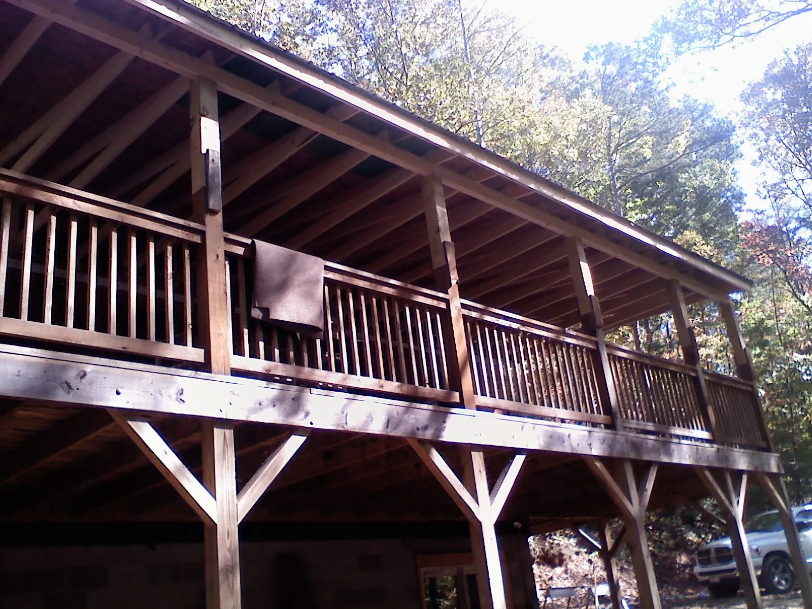 Timber framing under a new elevated porch and deck — Roof Leak Repair in Reedsport by Roofing Brothers